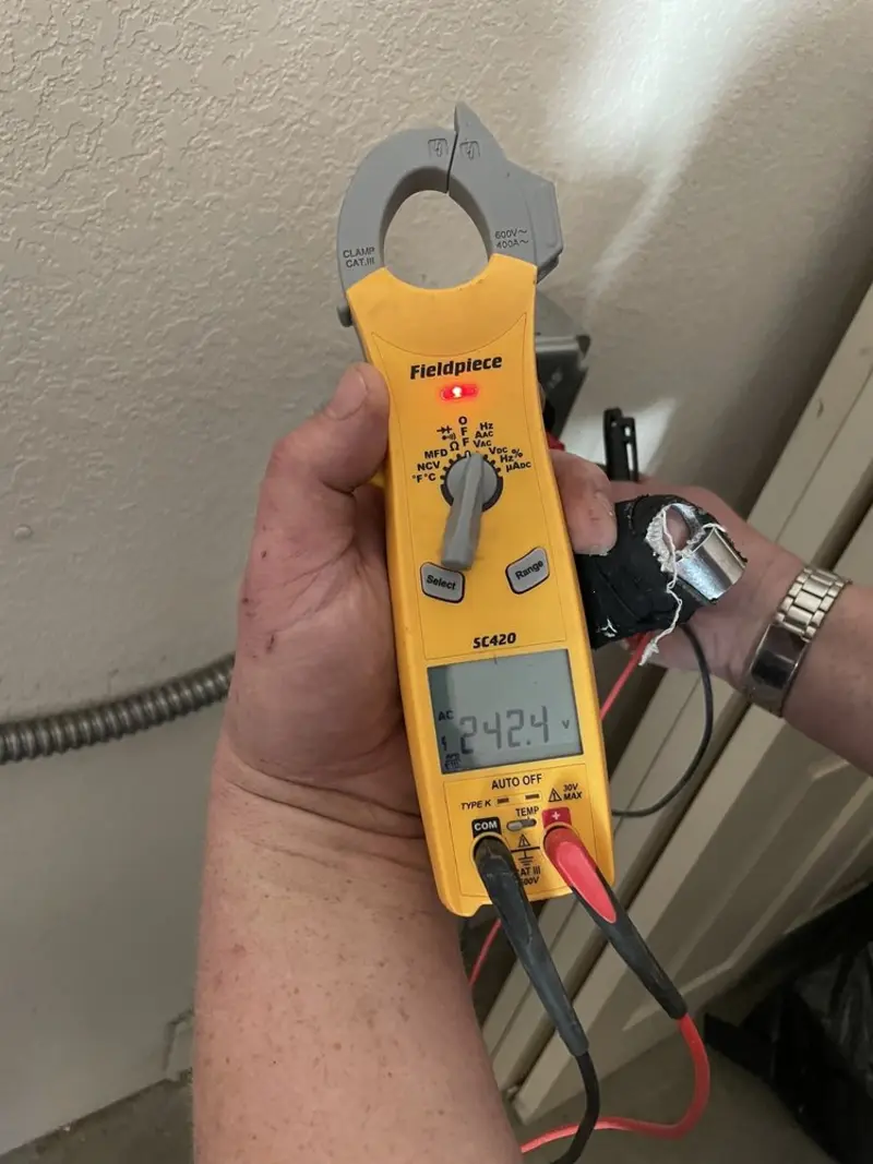 Voltage testing with clamp meter during Generator Installation in West Tisbury